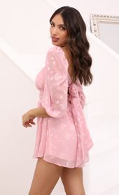 Picture thumb Nora Puff Sleeve Floral Romper in Pink. Source: https://media.lucyinthesky.com/data/Apr21_1/170xAUTO/1V9A4455.JPG
