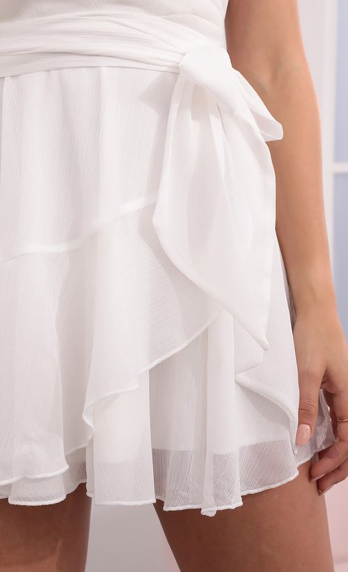 Picture Ava Wrap Dress in White Shimmer. Source: https://media.lucyinthesky.com/data/Apr21_1/500xAUTO/1V9A6757.JPG