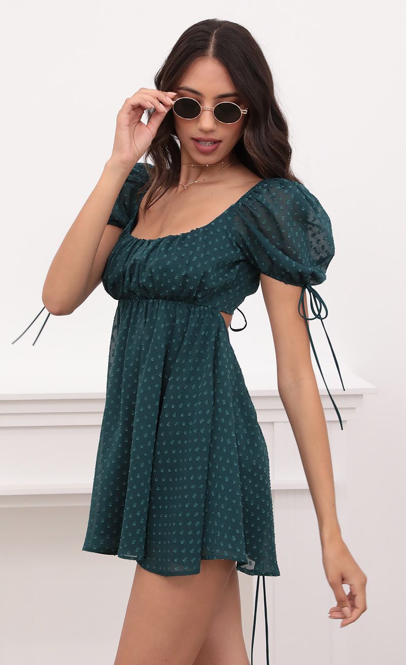 Picture Leilani Dotted Chiffon Baby Doll Dress in Hunter Green. Source: https://media.lucyinthesky.com/data/Apr21_1/800xAUTO/1V9A2303.JPG