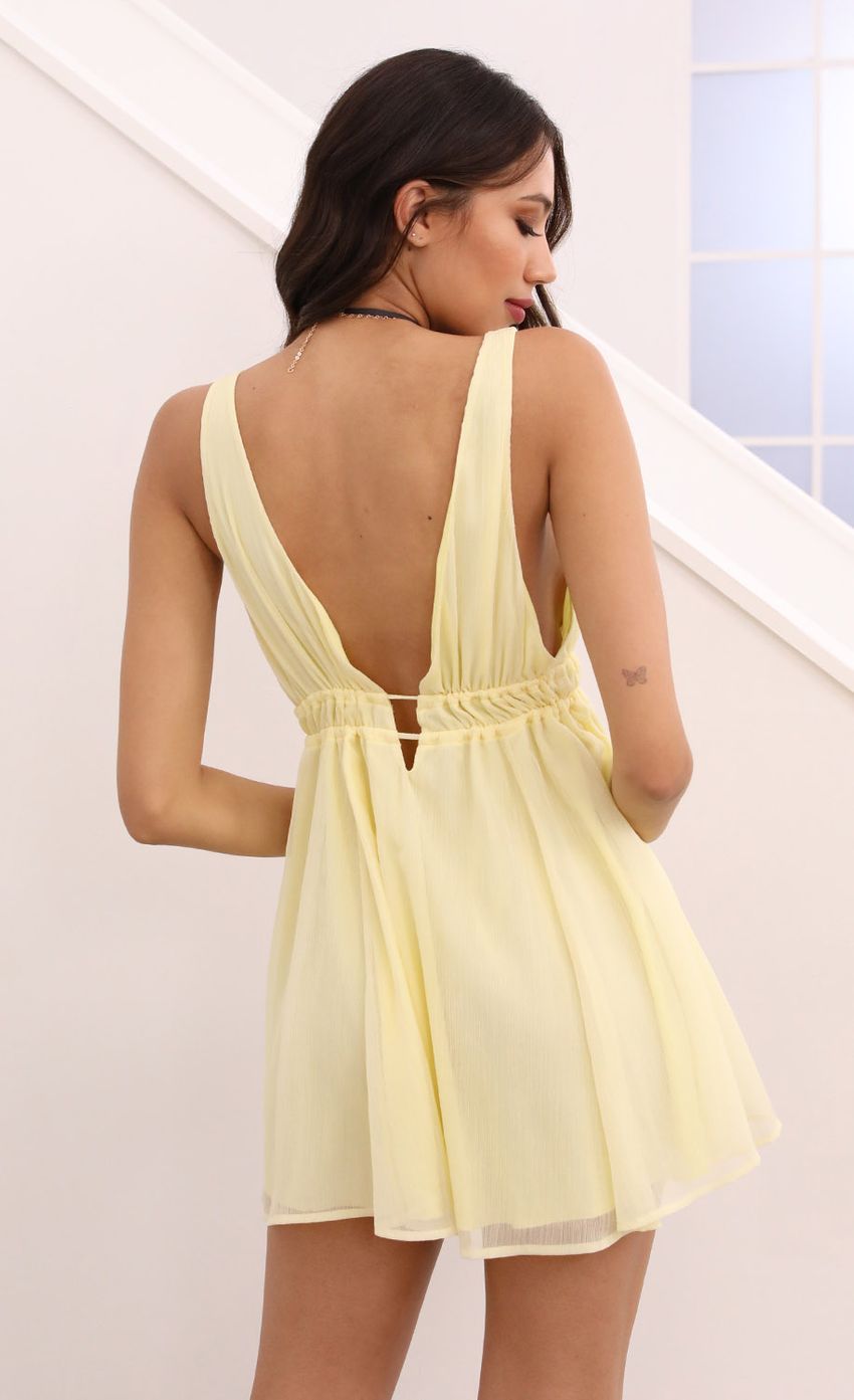 Picture Svana Plunge A-line Dress in Light Yellow Crinkle. Source: https://media.lucyinthesky.com/data/Apr21_1/850xAUTO/1V9A5046.JPG