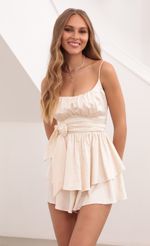 Picture Cora Ruffle White Romper. Source: https://media.lucyinthesky.com/data/Apr21_2/150xAUTO/1V9A3792.JPG