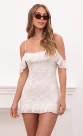 Picture thumb Clemence Off The Shoulder Ruffle Dress in White Lace. Source: https://media.lucyinthesky.com/data/Apr21_2/170xAUTO/1V9A0032.JPG