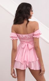 Picture thumb Mariana Ruched Wrap Tie Romper in Satin Pink. Source: https://media.lucyinthesky.com/data/Apr21_2/170xAUTO/1V9A0090.JPG