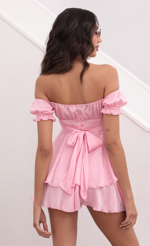 Picture Mariana Ruched Wrap Tie Romper in Satin Pink. Source: https://media.lucyinthesky.com/data/Apr21_2/500xAUTO/1V9A0090.JPG