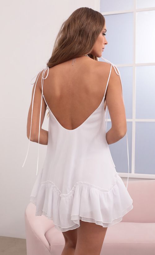 Picture Twinkle Baby Dress in White Shimmer. Source: https://media.lucyinthesky.com/data/Apr21_2/500xAUTO/1V9A1350.JPG