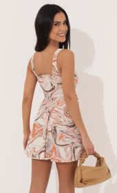 Picture thumb Key West A-line Dress in Orange Swirl. Source: https://media.lucyinthesky.com/data/Apr22_1/170xAUTO/1V9A1982.JPG