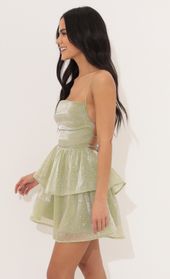 Picture thumb Aspen Lace Up Dress in Green Glitter. Source: https://media.lucyinthesky.com/data/Apr22_1/170xAUTO/1V9A2029.JPG