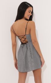 Picture thumb Lana A-line dress in Black and White Checkered. Source: https://media.lucyinthesky.com/data/Apr22_1/170xAUTO/1V9A5801.JPG