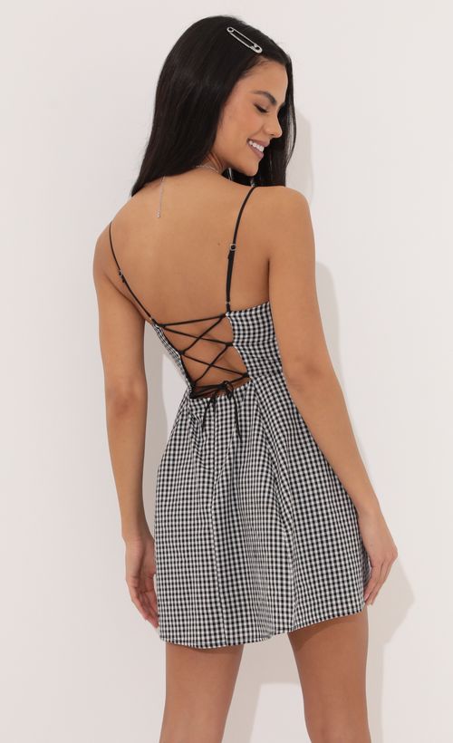 Picture Lana A-line dress in Black and White Checkered. Source: https://media.lucyinthesky.com/data/Apr22_1/500xAUTO/1V9A5801.JPG