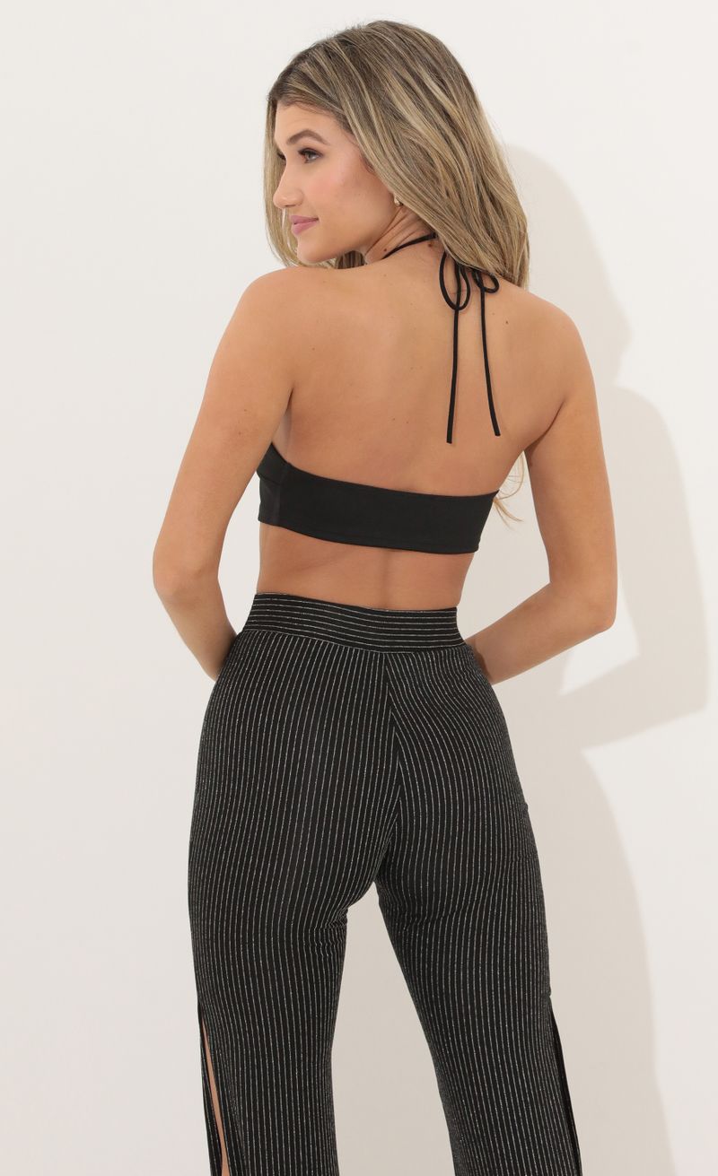 Picture Norah Halter Top in Black. Source: https://media.lucyinthesky.com/data/Apr22_1/800xAUTO/1V9A0268.JPG