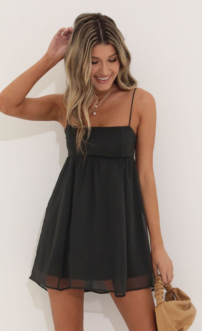 Picture Juno Baby Doll Dress in Black Chiffon. Source: https://media.lucyinthesky.com/data/Apr22_1/850xAUTO/1V9A0686.JPG