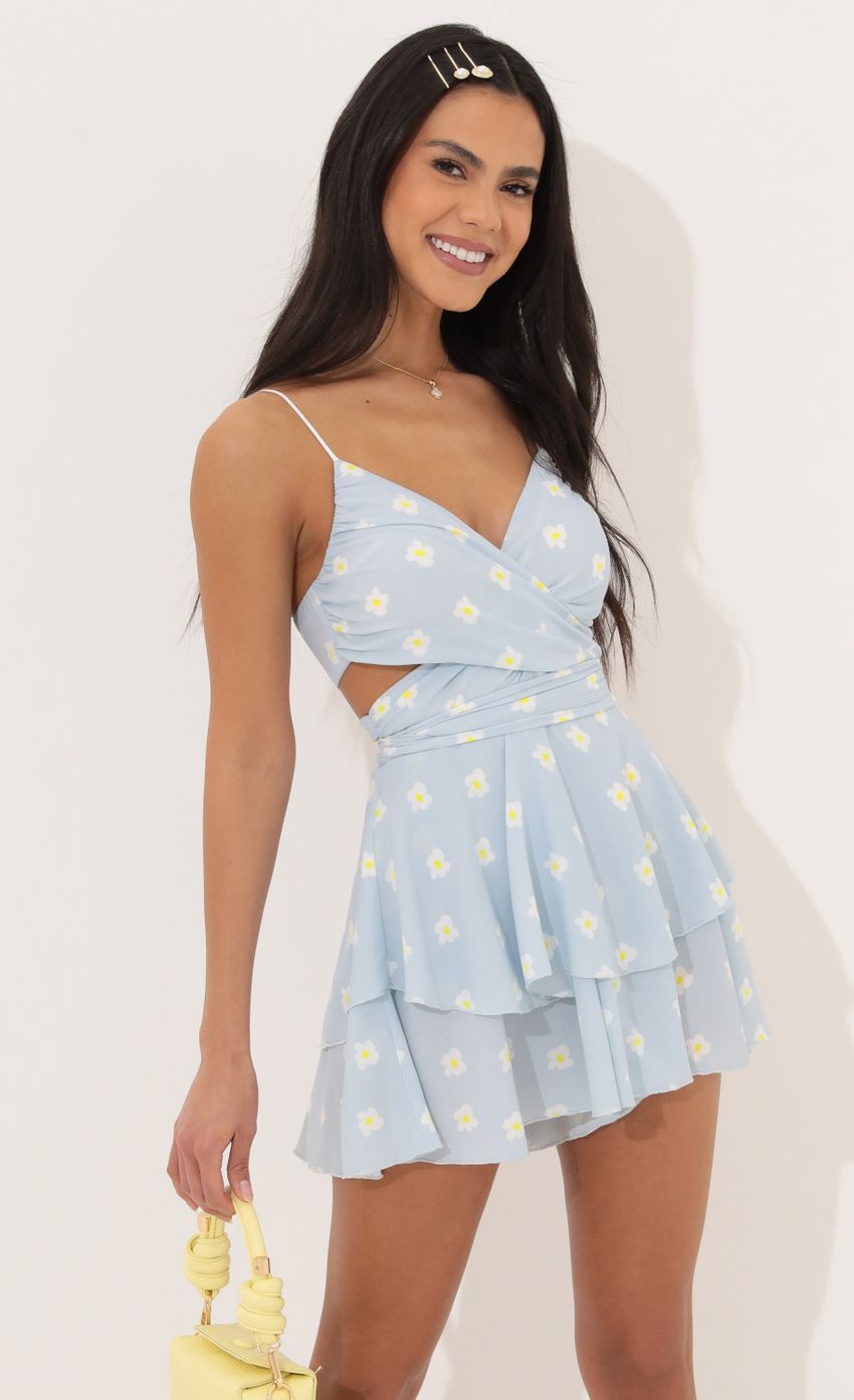 Picture Shelby Ruffle Baby Doll Romper in Blue Daisy. Source: https://media.lucyinthesky.com/data/Apr22_1/850xAUTO/1V9A4571.JPG