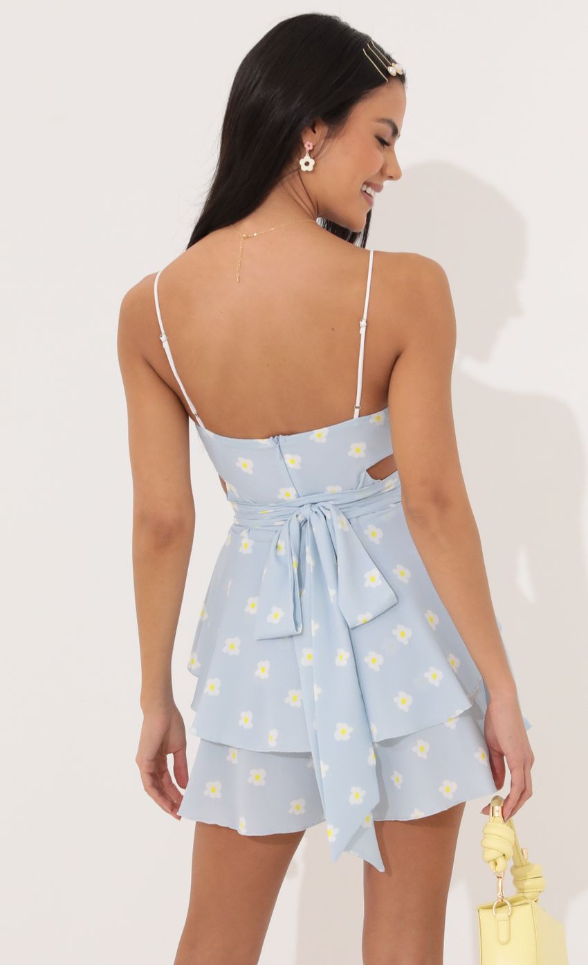 Picture Shelby Ruffle Baby Doll Romper in Blue Daisy. Source: https://media.lucyinthesky.com/data/Apr22_1/850xAUTO/1V9A4710.JPG