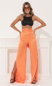 Picture thumb Taria Wide Leg Pants in Orange. Source: https://media.lucyinthesky.com/data/Apr22_2/170xAUTO/1V9A5260.JPG