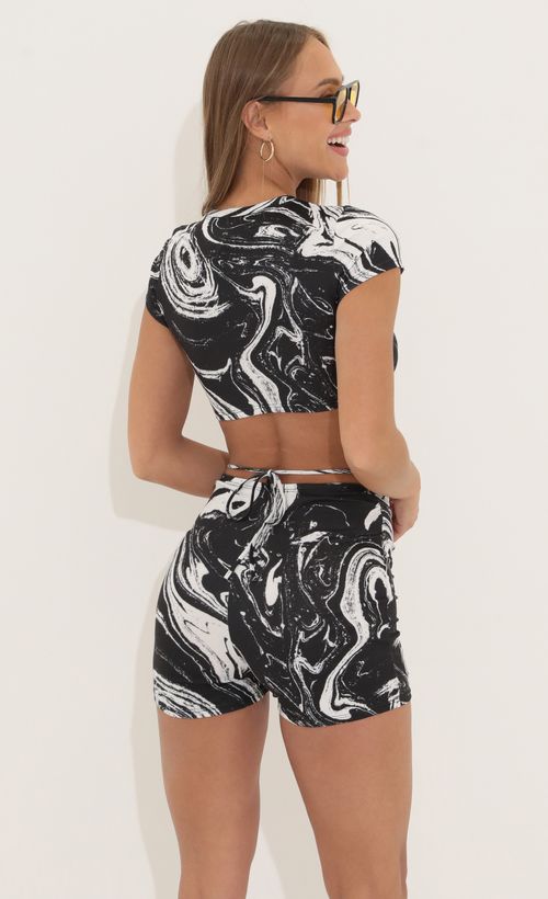Picture Kass Two Piece Set in in Black Swirl. Source: https://media.lucyinthesky.com/data/Apr22_2/500xAUTO/1V9A3698.JPG
