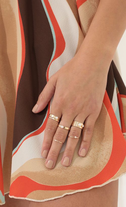 Picture Hidden Gems Ring Set in Gold. Source: https://media.lucyinthesky.com/data/Apr22_2/500xAUTO/1V9A3712.JPG