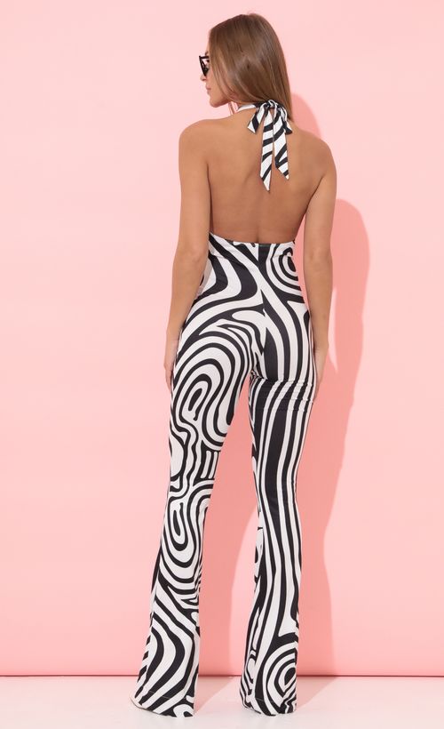 Picture Freya Shimmer Jumpsuit in Black Stripes. Source: https://media.lucyinthesky.com/data/Apr22_2/500xAUTO/1V9A6312.JPG