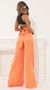 Picture Taria Wide Leg Pants in Orange. Source: https://media.lucyinthesky.com/data/Apr22_2/50x90/1V9A5397.JPG