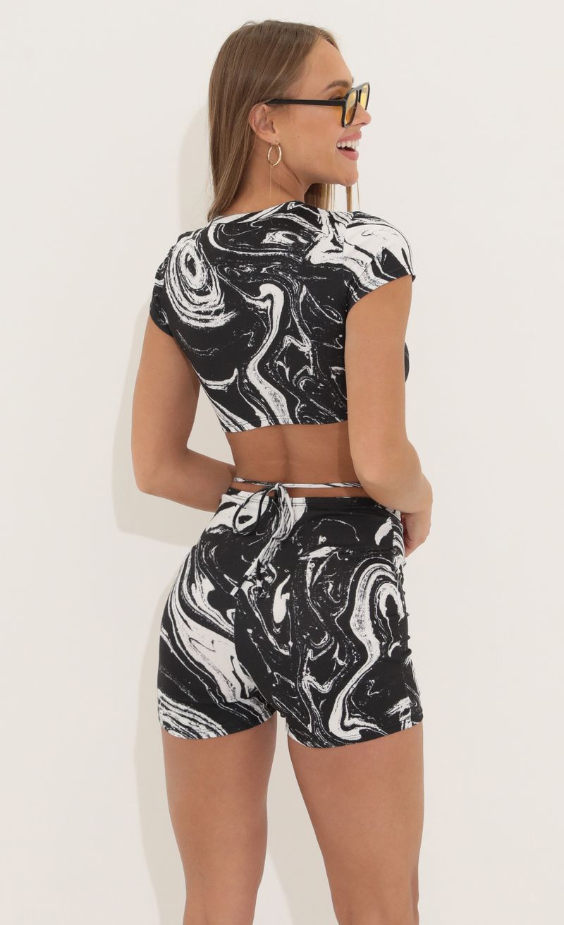 Picture Kass Two Piece Set in in Black Swirl. Source: https://media.lucyinthesky.com/data/Apr22_2/800xAUTO/1V9A3698.JPG