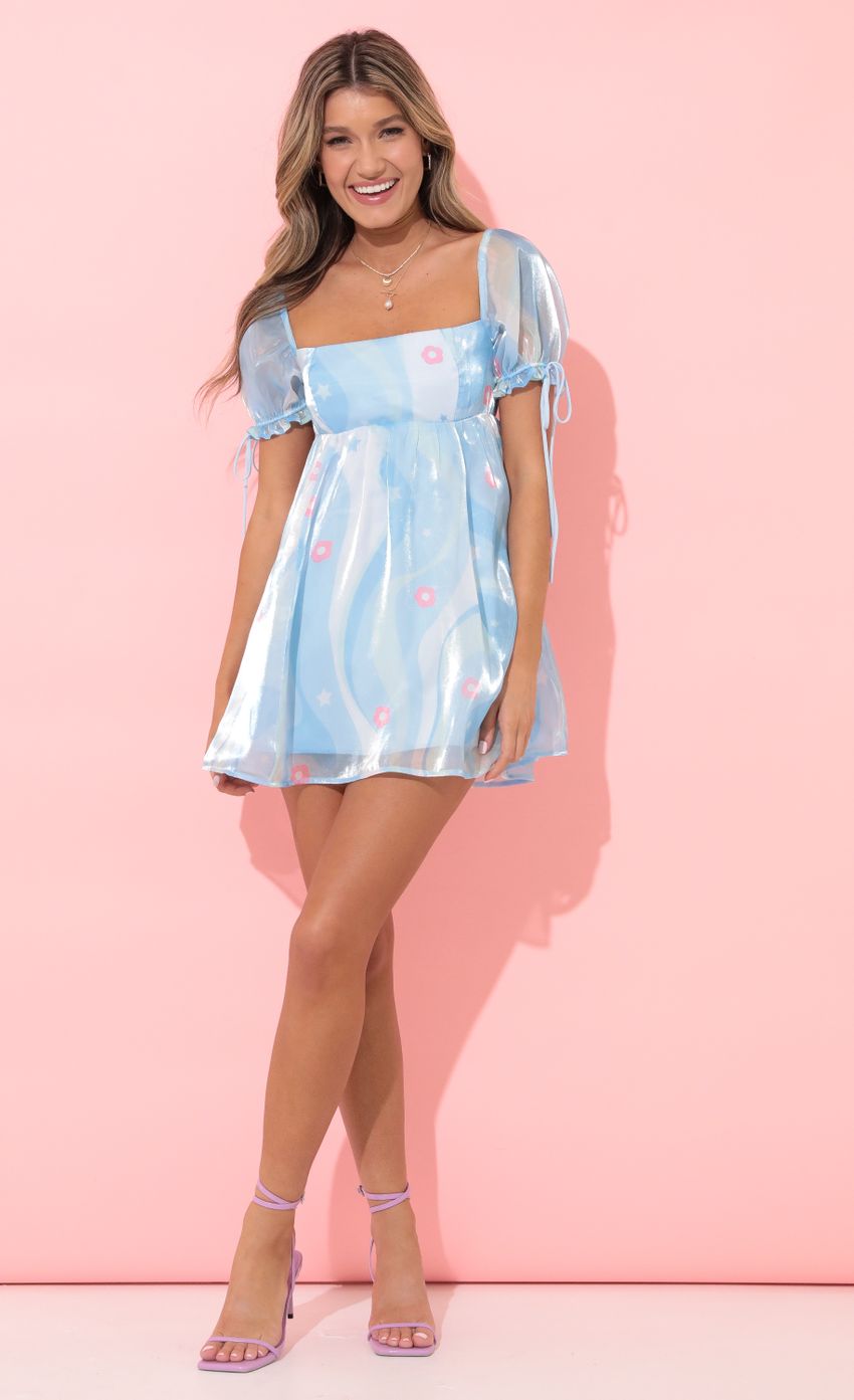 Picture Emerson Baby Doll Dress in Blue Floral Organza. Source: https://media.lucyinthesky.com/data/Apr22_2/850xAUTO/1V9A8416.JPG