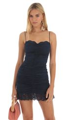 Picture Ginevra Lace Ruched Dress in Shimmer Navy. Source: https://media.lucyinthesky.com/data/Apr23/150xAUTO/0ab133a4-cad0-4b39-af1c-c351aa1c1be4.jpg