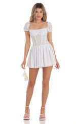Picture Ronnie Corset Puff Sleeve Dress in White. Source: https://media.lucyinthesky.com/data/Apr23/150xAUTO/3e9d472a-dd80-45ad-a876-2bc35053d06a.jpg