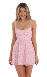 Picture Lana A-line dress in Floral Pink. Source: https://media.lucyinthesky.com/data/Apr23/150xAUTO/64a0bcb3-28b0-4613-80eb-087e5f265db5.jpg