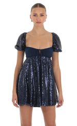 Picture Hana Sequin Puff Sleeve Baby Doll Dress in Navy. Source: https://media.lucyinthesky.com/data/Apr23/150xAUTO/64c0832d-13d8-4819-abf0-bc8fb8780f9e.jpg