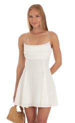 Picture Dora A-Line Dress in White. Source: https://media.lucyinthesky.com/data/Apr23/150xAUTO/933ae5b0-e21b-4d83-b9f3-4f9f4d4de8f1.jpg