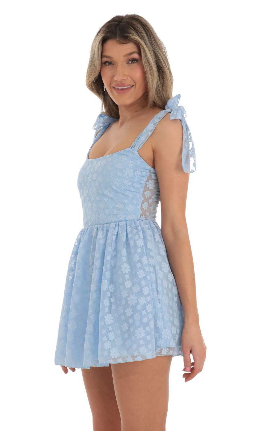 Picture Jacqueline Floral Dress in Blue. Source: https://media.lucyinthesky.com/data/Apr23/850xAUTO/1275d20e-c9b1-4cad-83f9-1293ced50393.jpg
