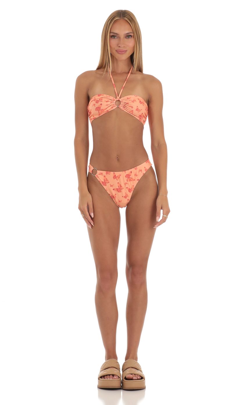 Picture Carmella Halter Bikini Set in Orange Print. Source: https://media.lucyinthesky.com/data/Apr23/850xAUTO/250af3ce-758d-466e-b4b9-ed9b958a93e5.jpg