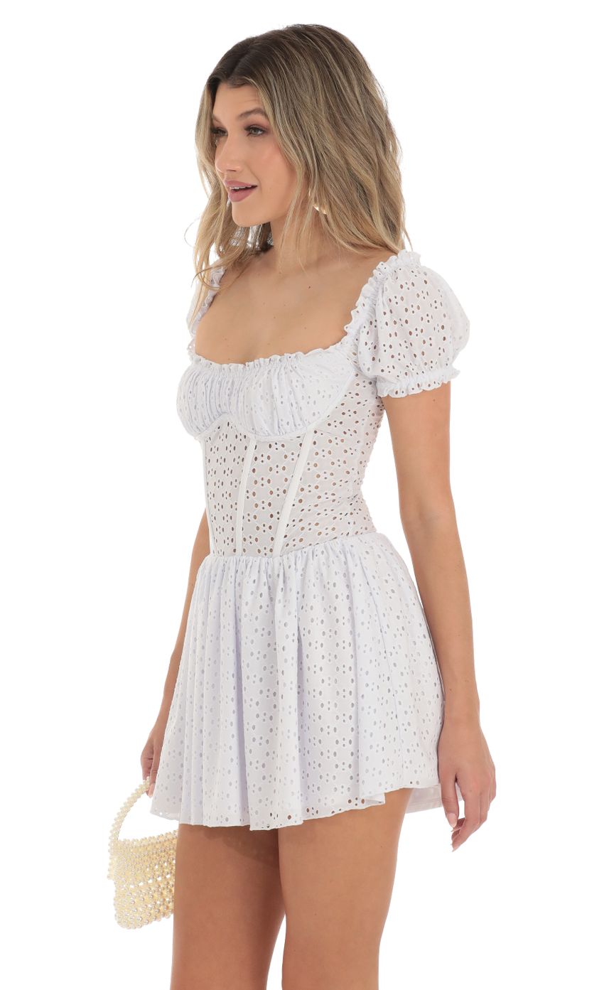 Picture Ronnie Corset Puff Sleeve Dress in White. Source: https://media.lucyinthesky.com/data/Apr23/850xAUTO/45801d9e-5796-4dc2-a743-bbd5d18c1d7b.jpg