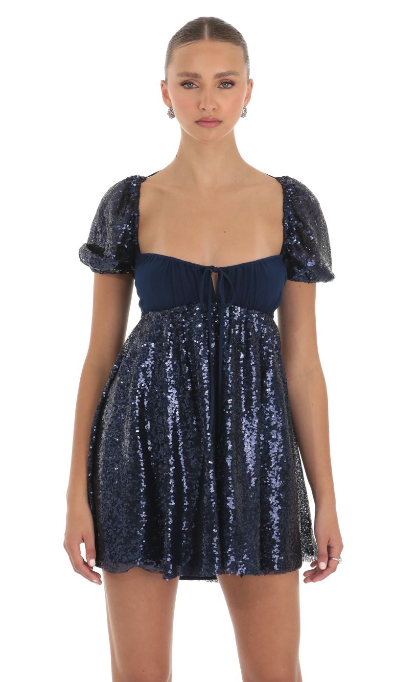Picture Hana Sequin Puff Sleeve Baby Doll Dress in Navy. Source: https://media.lucyinthesky.com/data/Apr23/850xAUTO/64c0832d-13d8-4819-abf0-bc8fb8780f9e.jpg
