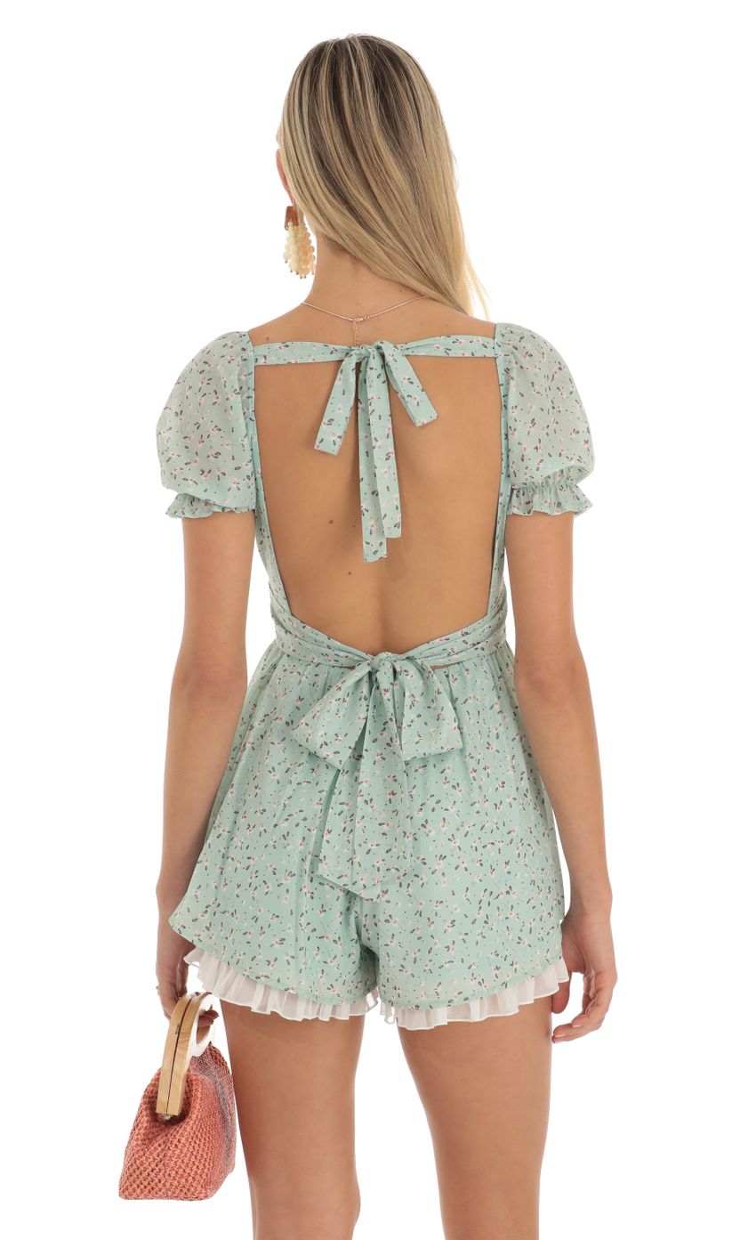 Picture Wayan Floral Foiled Romper in Green. Source: https://media.lucyinthesky.com/data/Apr23/850xAUTO/7df48f96-b98a-46ea-b996-ac2b7b8f8219.jpg