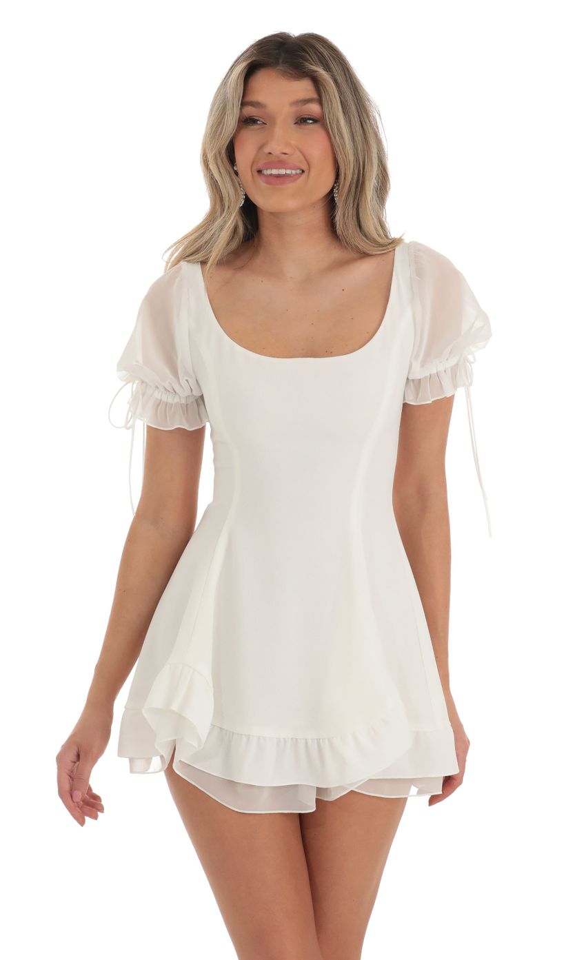 Picture Roux Chiffon Puff Sleeve Fit and Flare Dress in White. Source: https://media.lucyinthesky.com/data/Apr23/850xAUTO/94ebcea0-1f7f-471a-83a5-daab22a4be43.jpg