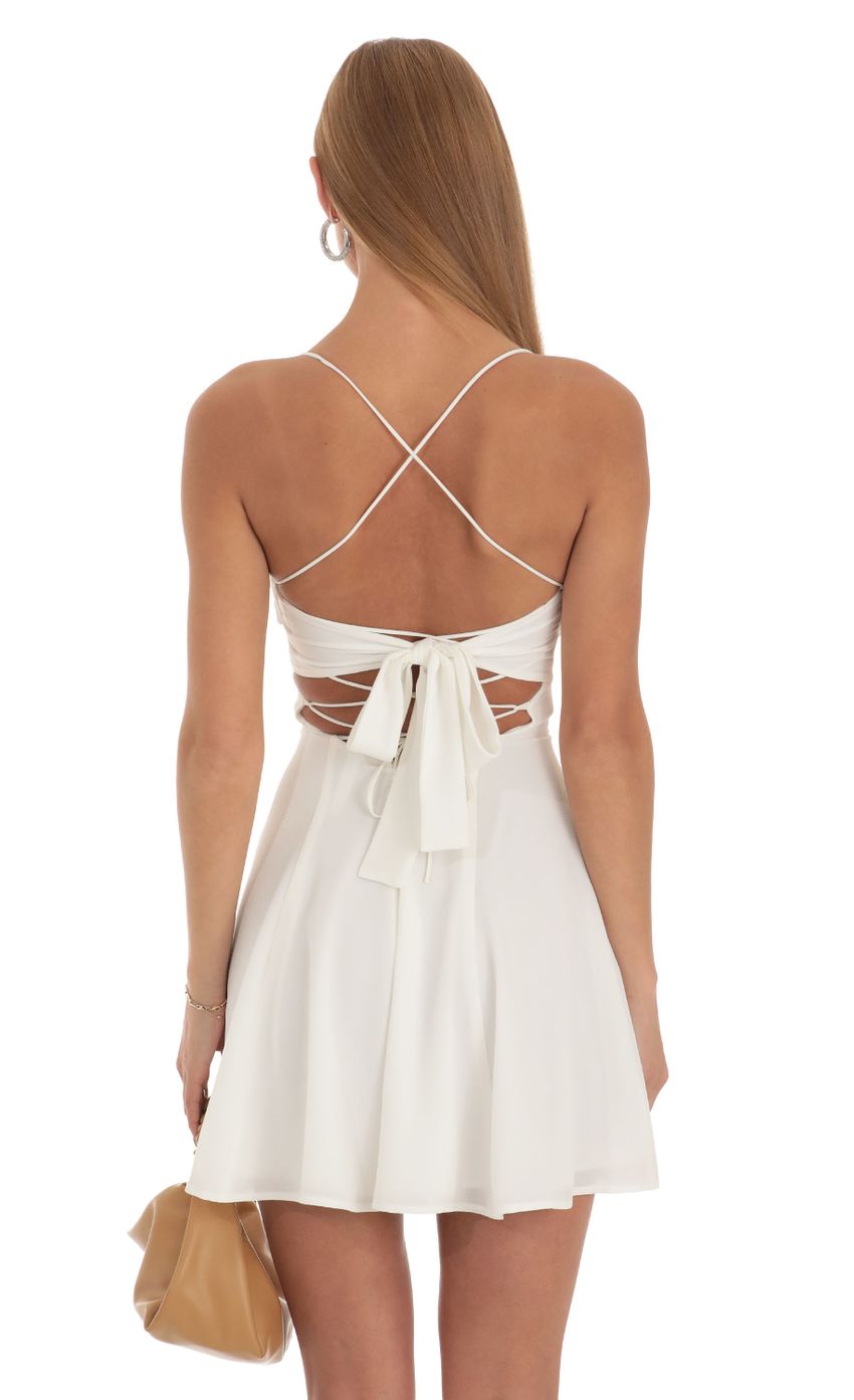 Picture Dora A-Line Dress in White. Source: https://media.lucyinthesky.com/data/Apr23/850xAUTO/ae6f5060-f41b-490d-a3d6-7d6abd10311d.jpg