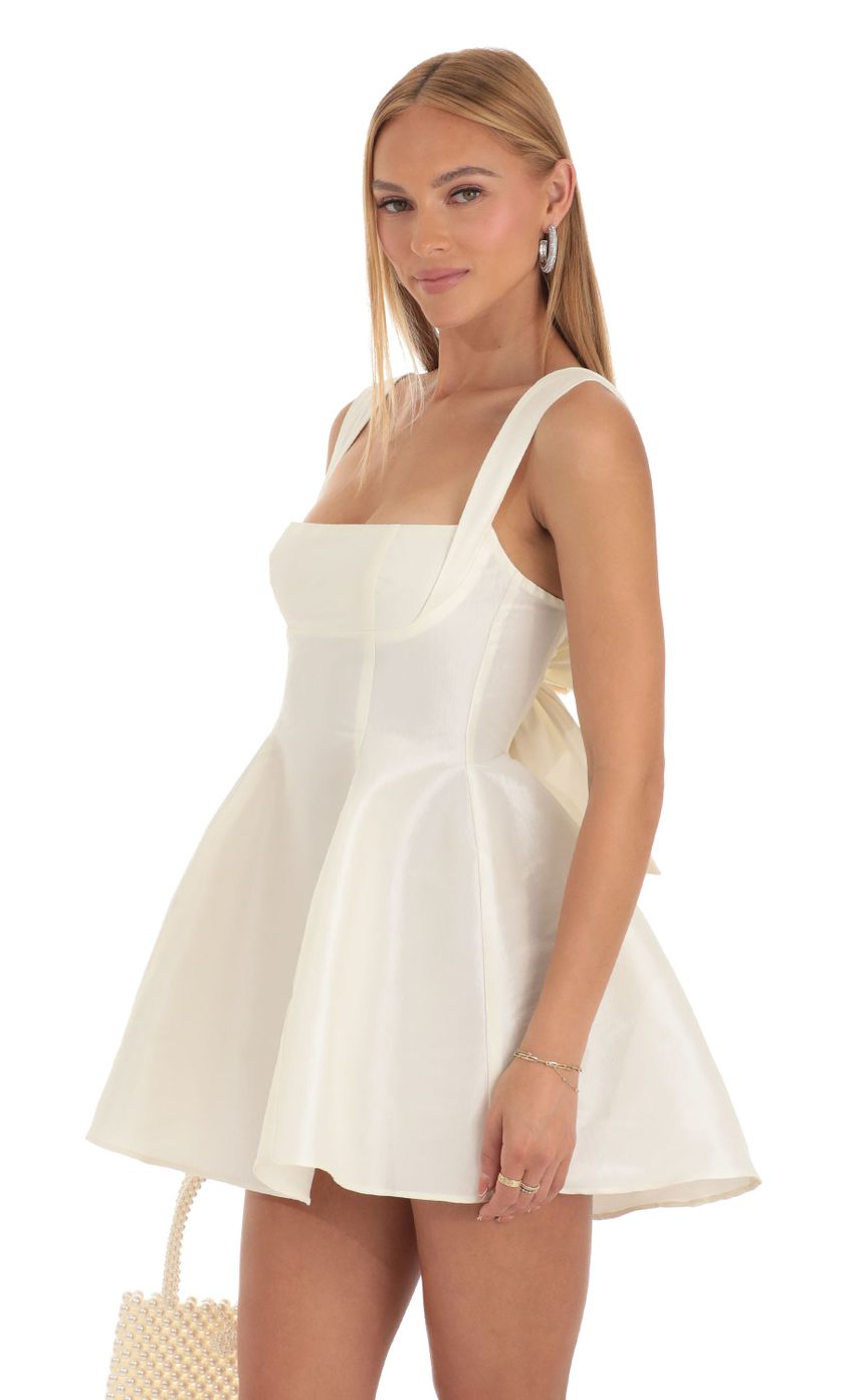 Picture Foxie Fit and Flare Dress in Ivory. Source: https://media.lucyinthesky.com/data/Apr23/850xAUTO/b5849cd6-0537-485b-a847-628285394cfd.jpg