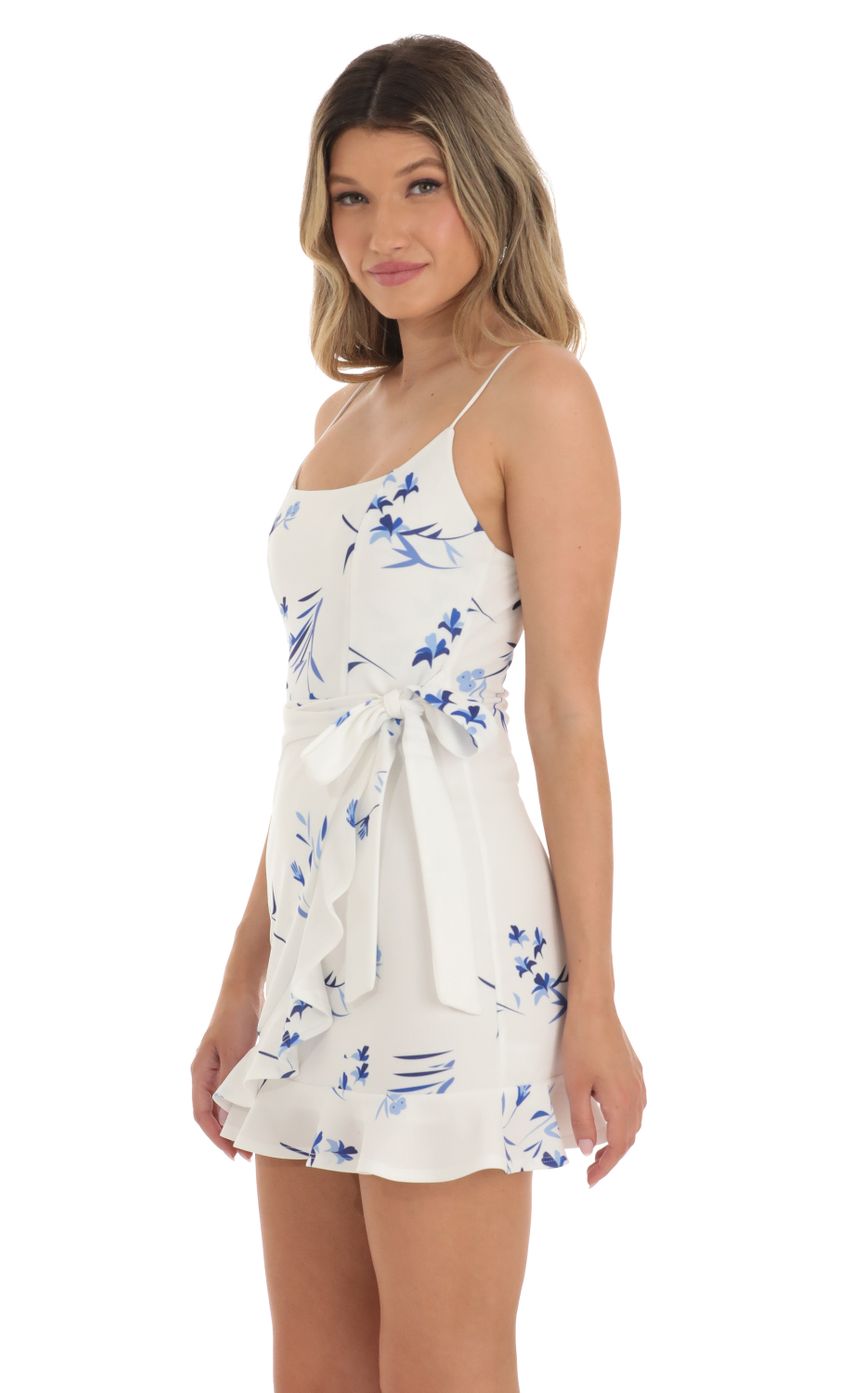Picture Capri Ruffle Tie Dress in White Floral. Source: https://media.lucyinthesky.com/data/Apr23/850xAUTO/bb917bc0-c970-4aed-9339-2f638f02859c.jpg