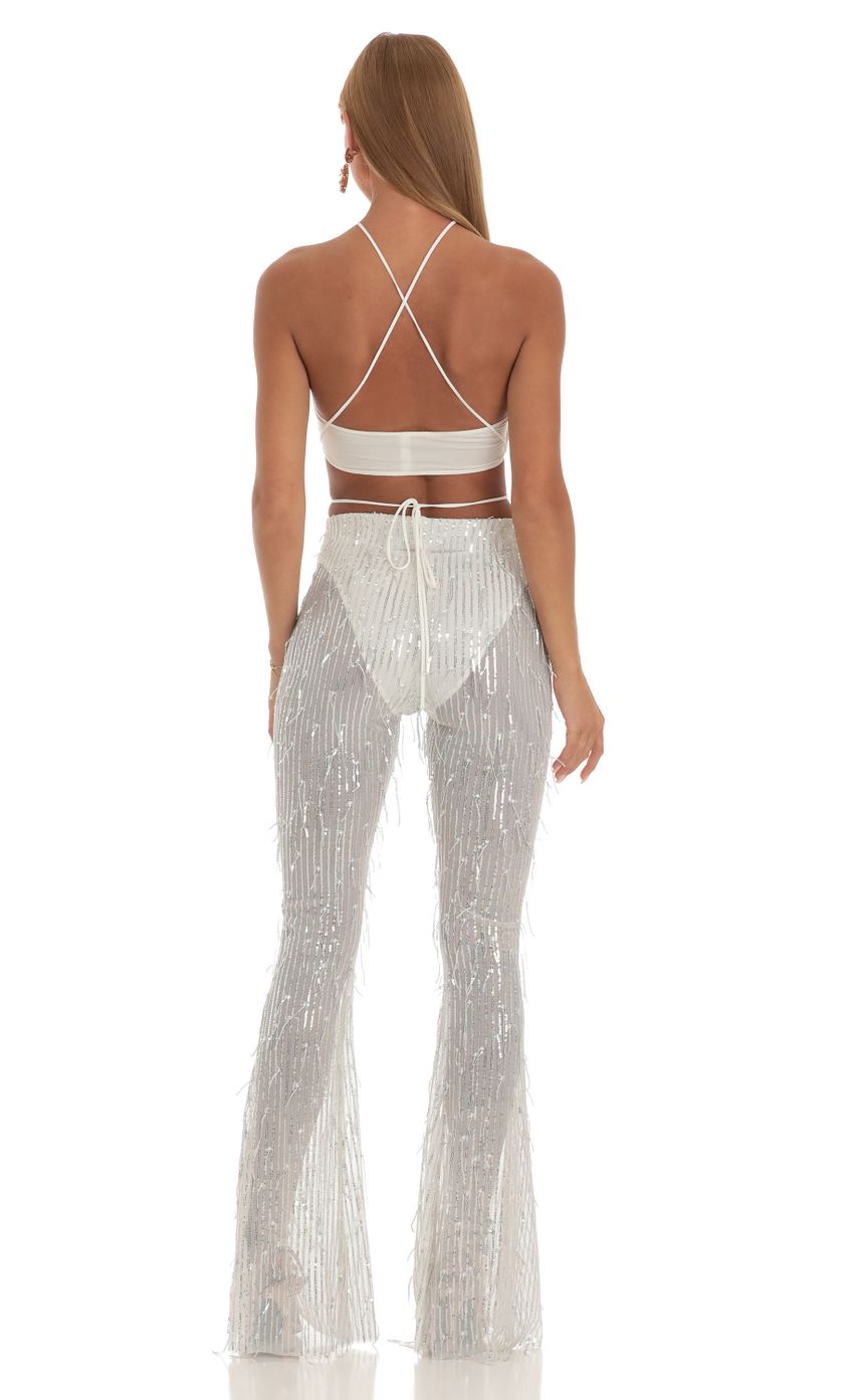 Picture Peony Fringe Sequin Three Piece Set in White. Source: https://media.lucyinthesky.com/data/Apr23/850xAUTO/bc6cc9f7-ddc0-4848-9d1f-77d78a961a3a.jpg