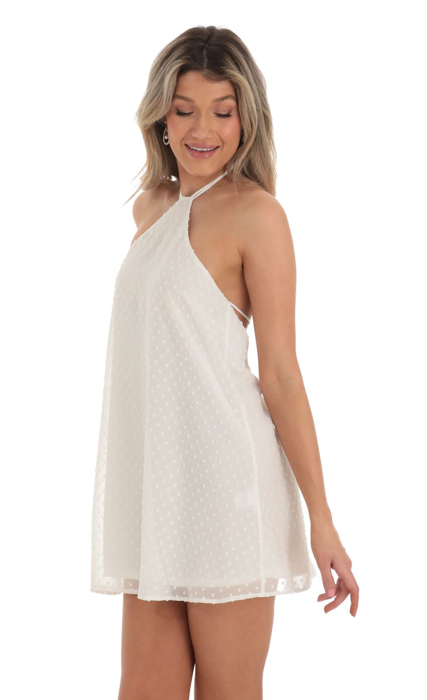Picture Maya Dotted Chiffon Halter Dress in White. Source: https://media.lucyinthesky.com/data/Apr23/850xAUTO/c0f87fe8-822c-4d3c-a311-d0dda375db0d.jpg