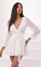 Picture thumb Lexi Ruffle Wrap Dress in Ivory Dotted Chiffon. Source: https://media.lucyinthesky.com/data/Aug20_1/170xAUTO/781A8341.JPG