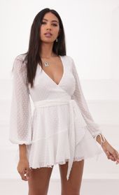 Picture thumb Lexi Ruffle Wrap Dress in Ivory Dotted Chiffon. Source: https://media.lucyinthesky.com/data/Aug20_1/170xAUTO/781A8358.JPG