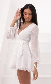 Picture thumb Lexi Ruffle Wrap Dress in Ivory Dotted Chiffon. Source: https://media.lucyinthesky.com/data/Aug20_1/170xAUTO/781A8370.JPG