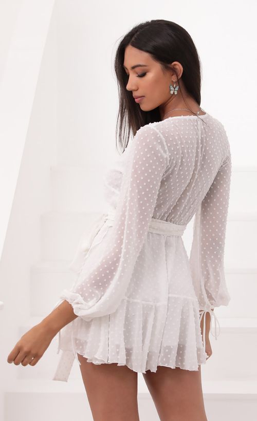 Picture Lexi Ruffle Wrap Dress in Ivory Dotted Chiffon. Source: https://media.lucyinthesky.com/data/Aug20_1/500xAUTO/781A8412.JPG