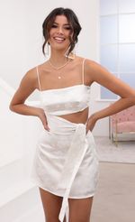 Picture Betsy Cutout Tie Dress in White Satin. Source: https://media.lucyinthesky.com/data/Aug20_2/150xAUTO/781A7121.JPG