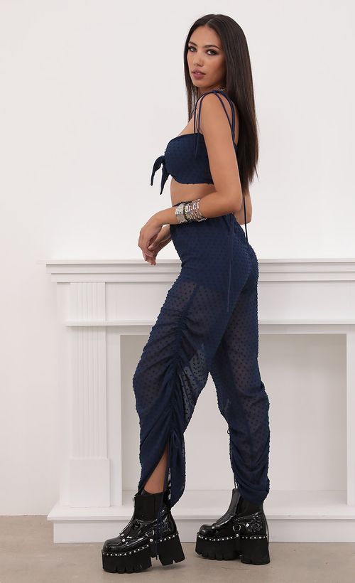 Picture Carly Ruched Pant Set in Chiffon Navy Dots. Source: https://media.lucyinthesky.com/data/Aug20_2/500xAUTO/781A5465.JPG