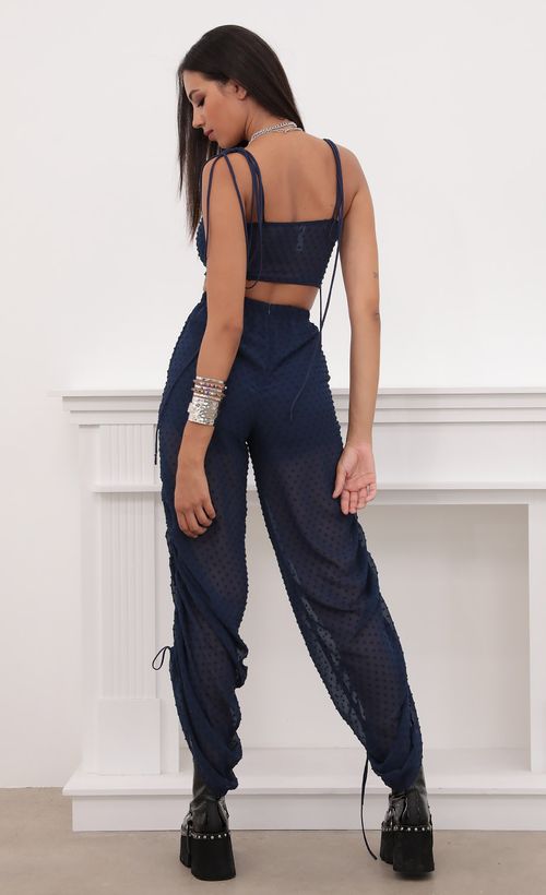 Picture Carly Ruched Pant Set in Chiffon Navy Dots. Source: https://media.lucyinthesky.com/data/Aug20_2/500xAUTO/781A5520.JPG