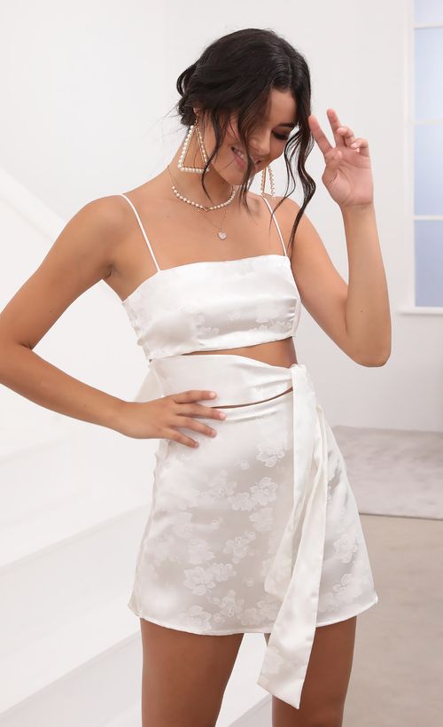 Picture Betsy Cutout Tie Dress in White Satin. Source: https://media.lucyinthesky.com/data/Aug20_2/500xAUTO/781A7146.JPG
