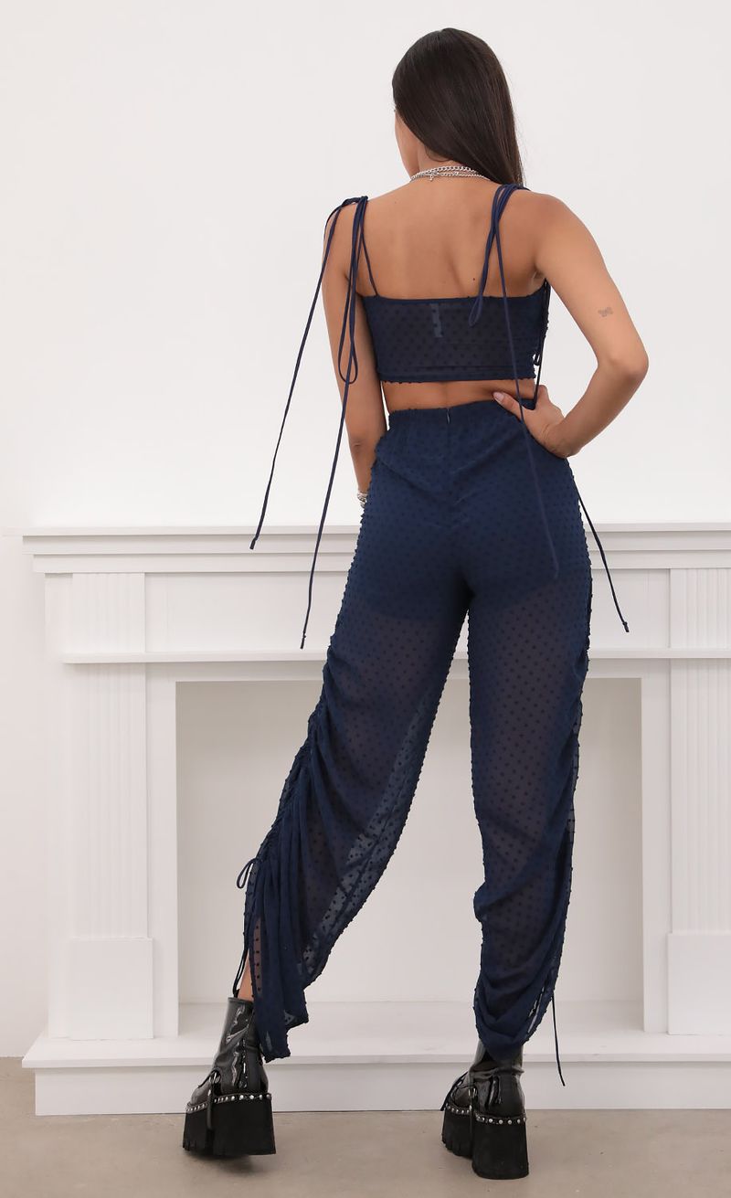 Picture Carly Ruched Pant Set in Chiffon Navy Dots. Source: https://media.lucyinthesky.com/data/Aug20_2/800xAUTO/781A5516.JPG