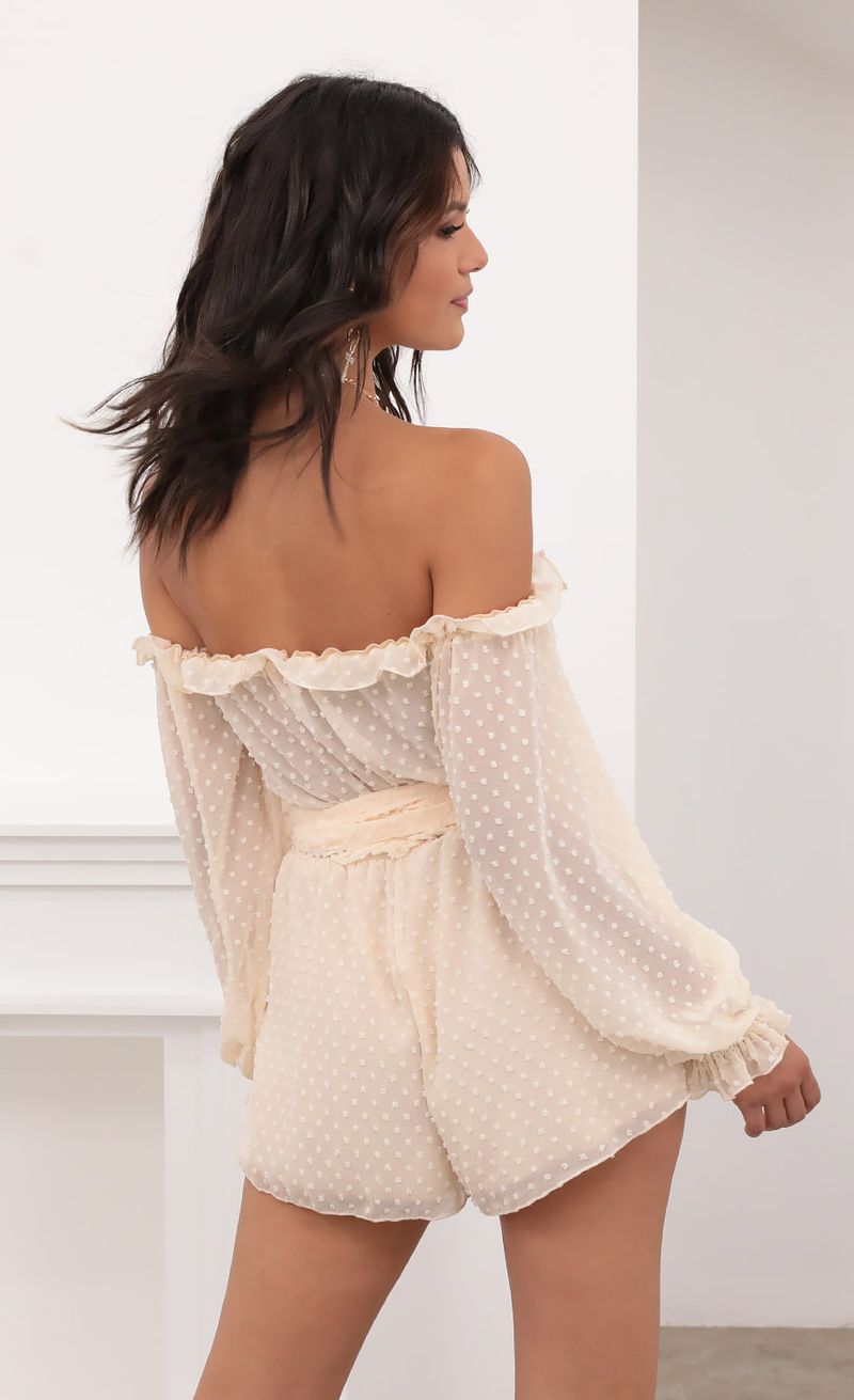 Picture Vallarta Off The Shoulder Romper in Chiffon Polka Dot Ivory. Source: https://media.lucyinthesky.com/data/Aug20_2/800xAUTO/781A9014.JPG